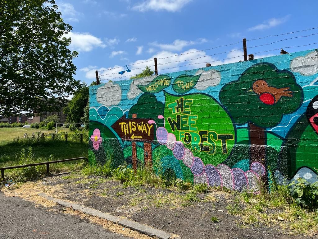 June 2023: Glasgow's fourth Wee Forest. mural painted by local school and community.