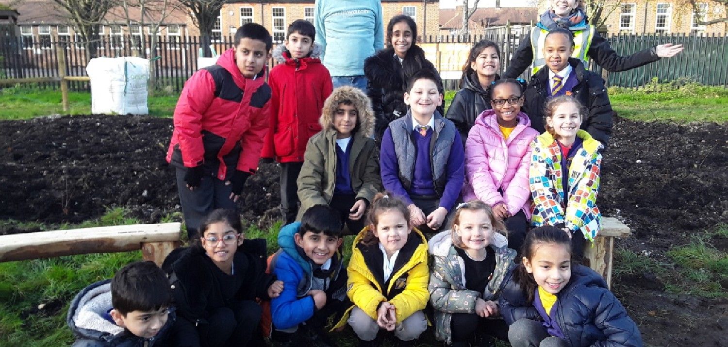 Millbrook Combined School students planting their Tiny Forest. Photo Credit: Millbrook Combined School