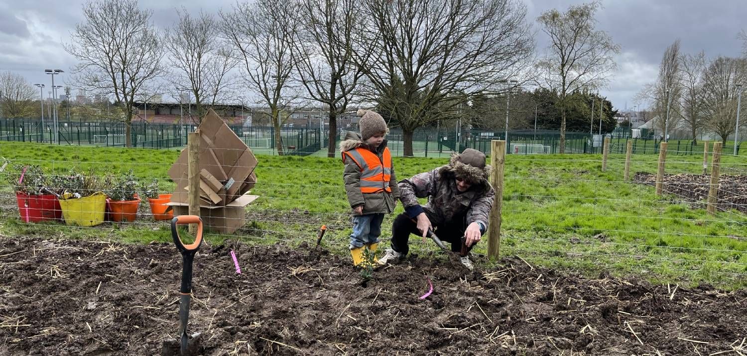 Young helper at the Tiny Forest Planting Day (Photo Credit: Earthwatch Europe)