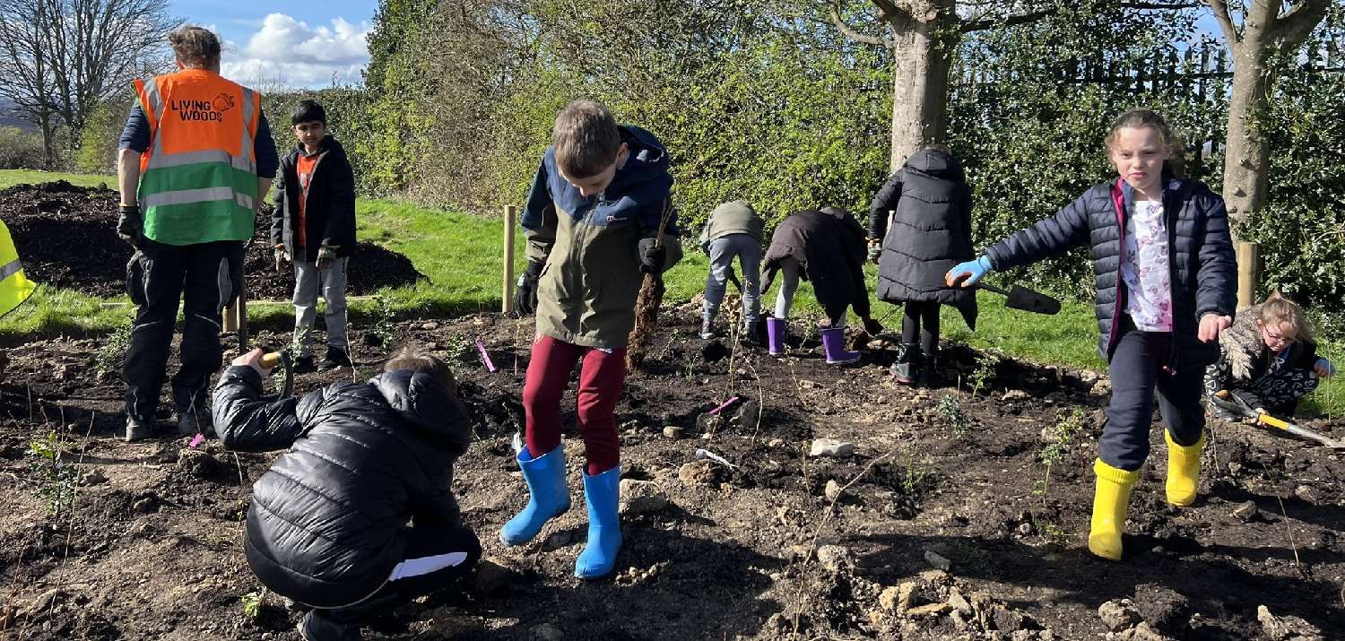 March 2024: Tiny Forest Planting Day Portobello School (Photo Credit: Earthwatch Europe)