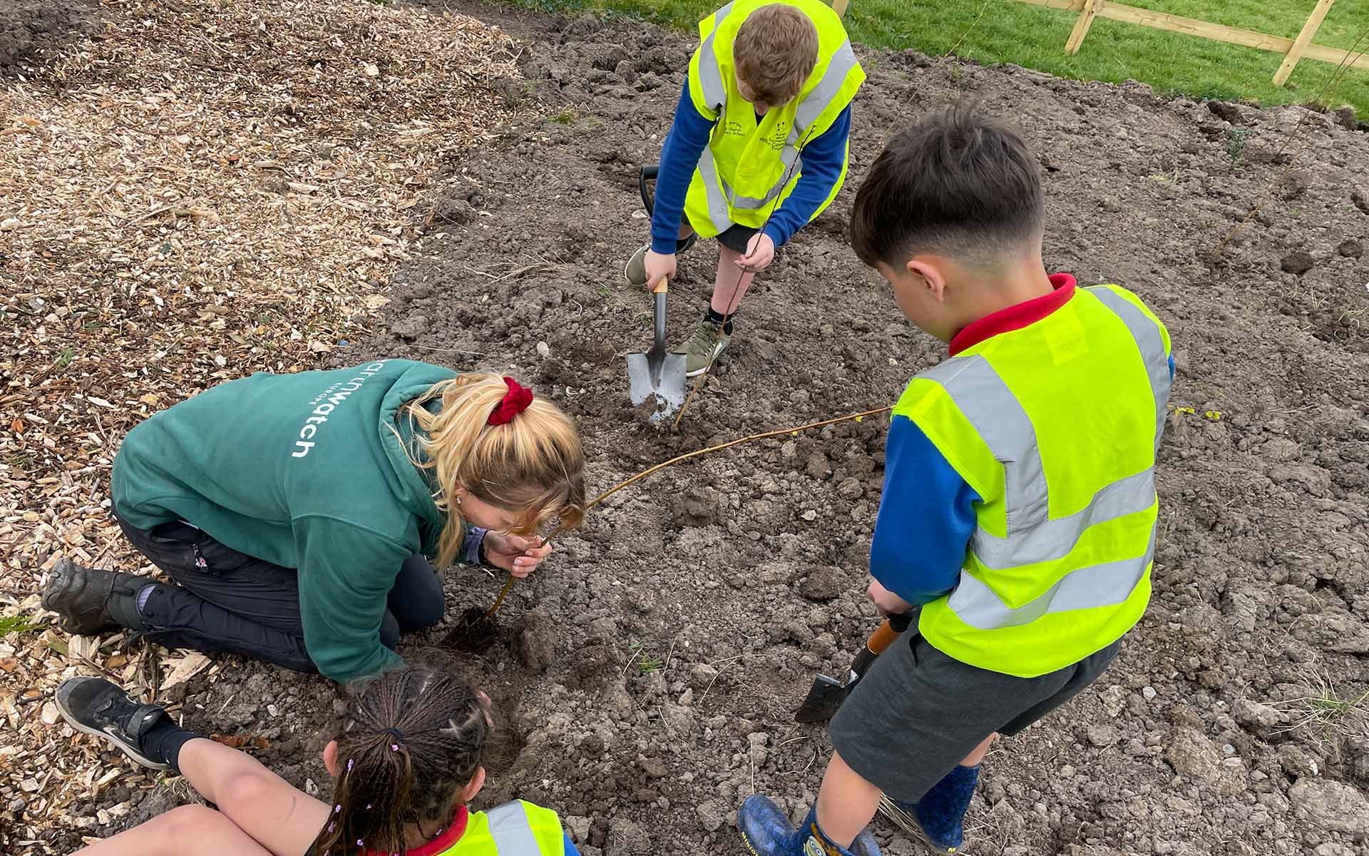 Walford Avenue Open Space school children planting trees