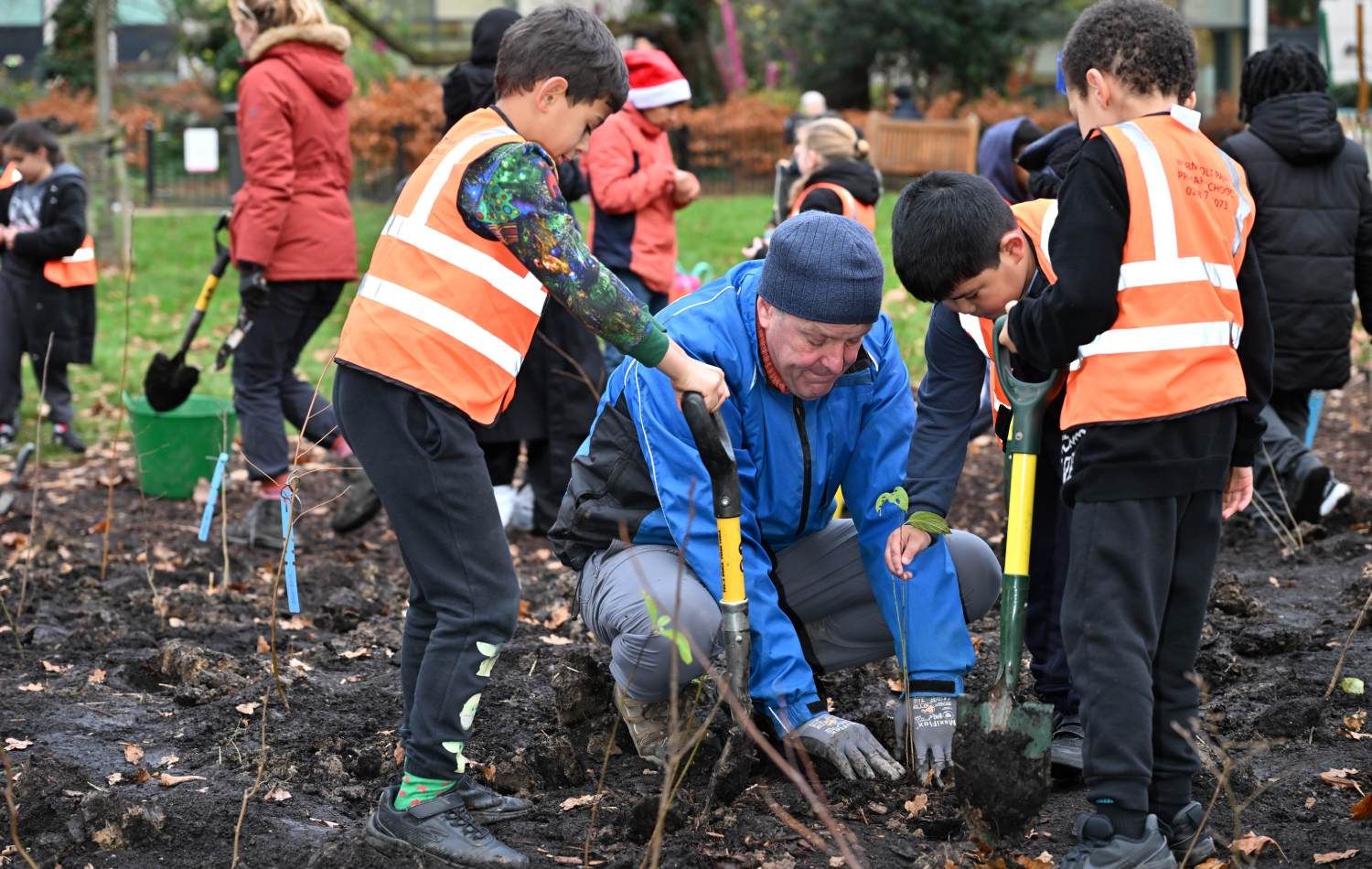 Wormholt Park Tiny Forest: Earthwatch planting with School children