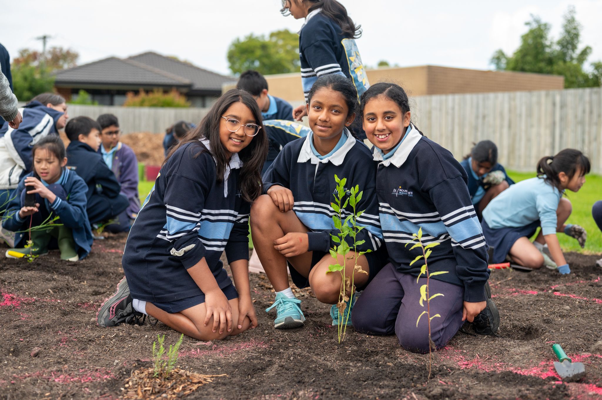 Children from Mt View Primary School at the Fraser Street Tiny Forest planting day